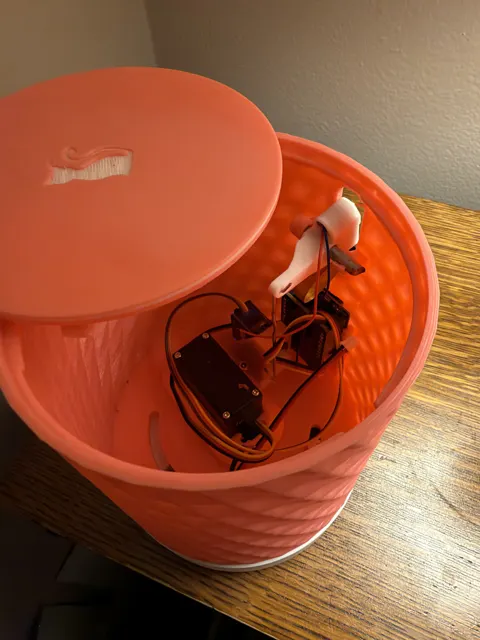 CatZoom with its lid off: the pan and tilt servos, the laser bell crank and wiring inside the shade
